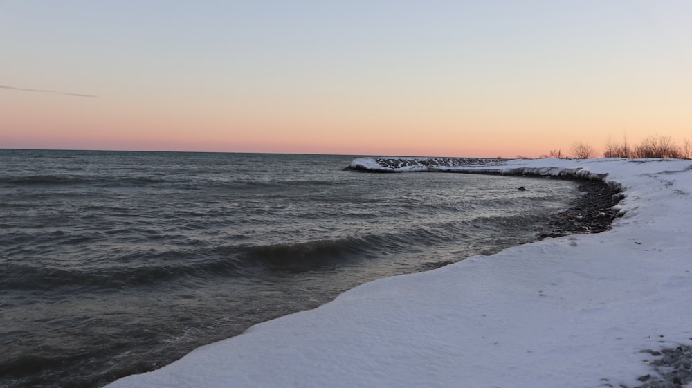 a body of water that is covered in snow