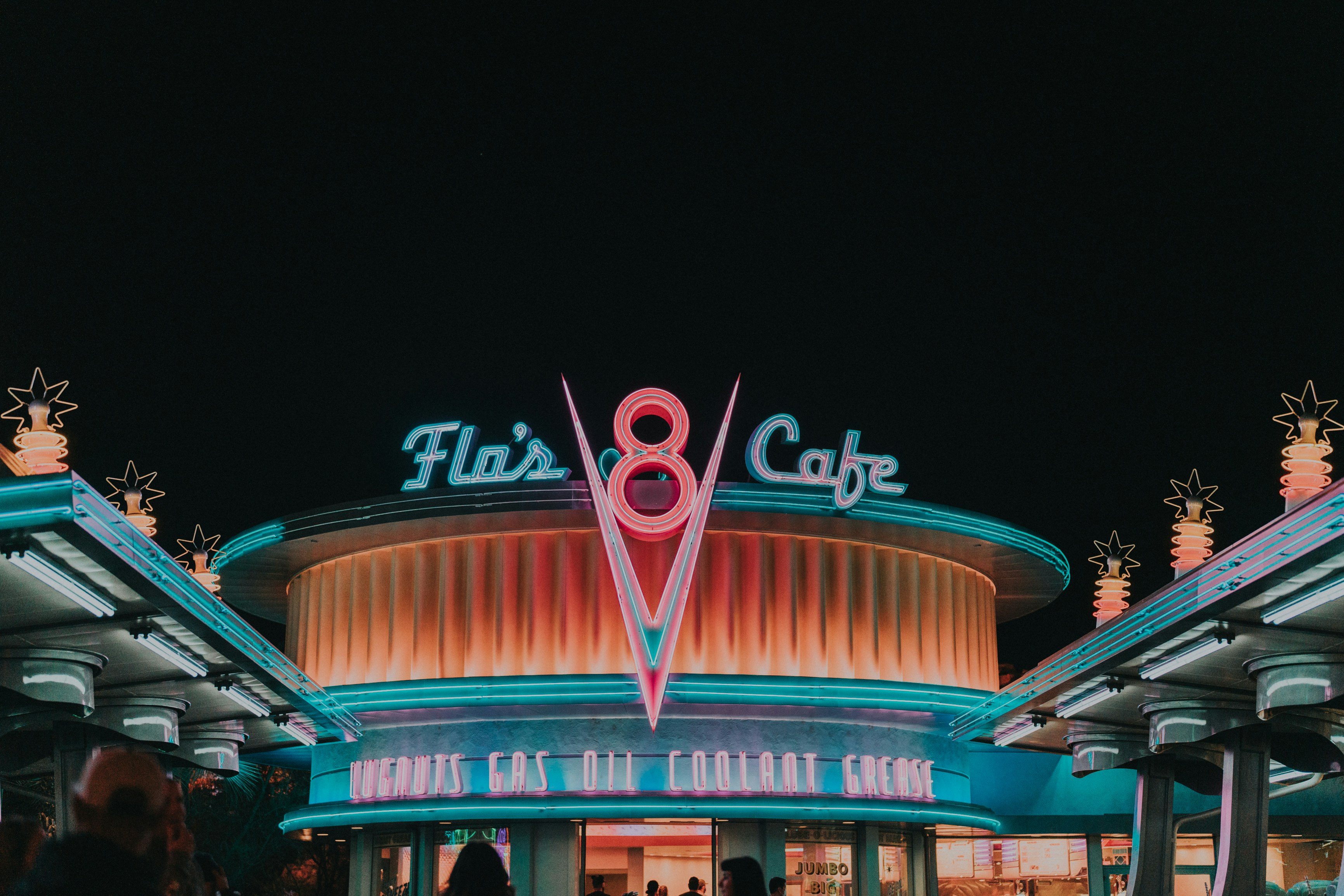 a large building that has a giant sign on it, 