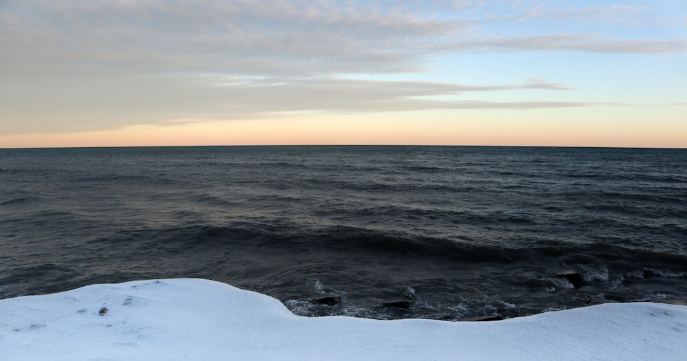 a view of a body of water from a cliff