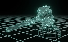 a 3d image of a judge's hammer on a black background