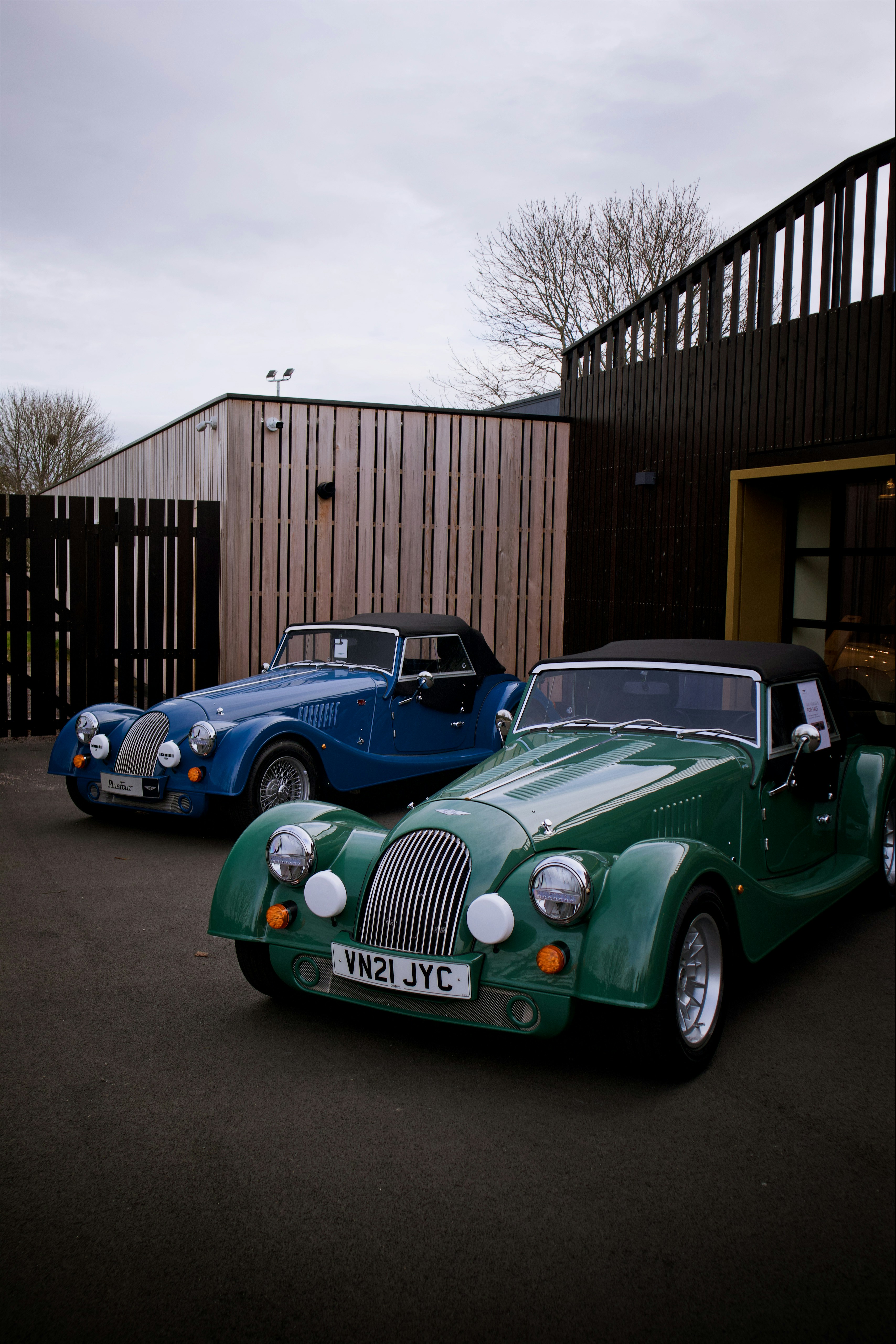 a couple of cars parked next to each other