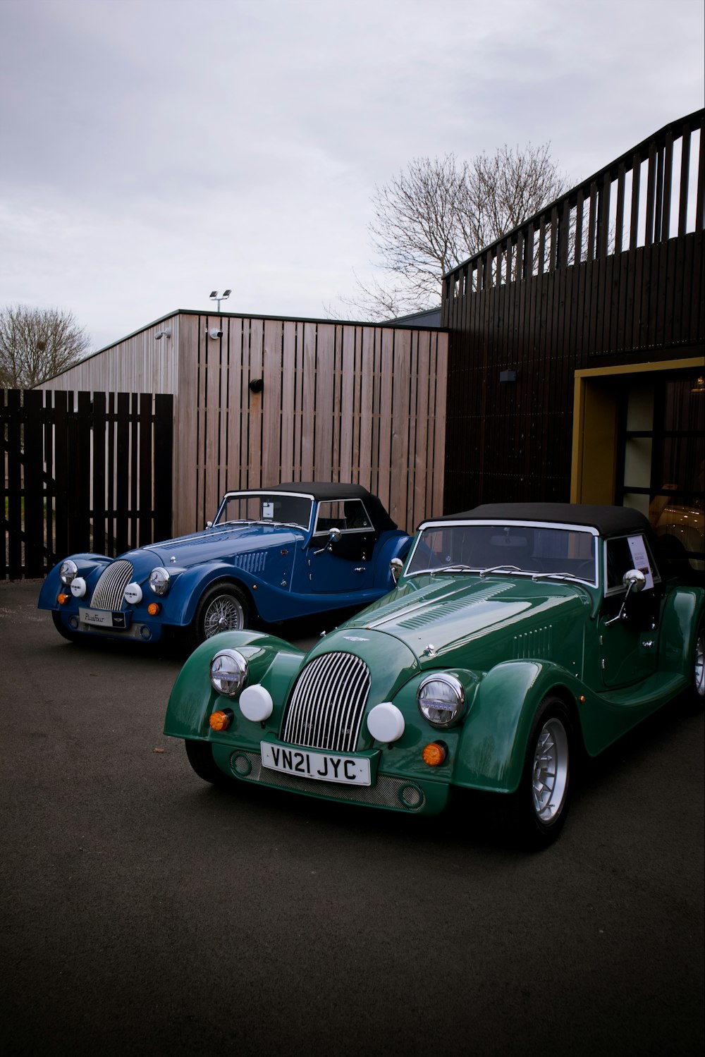 a couple of cars parked next to each other