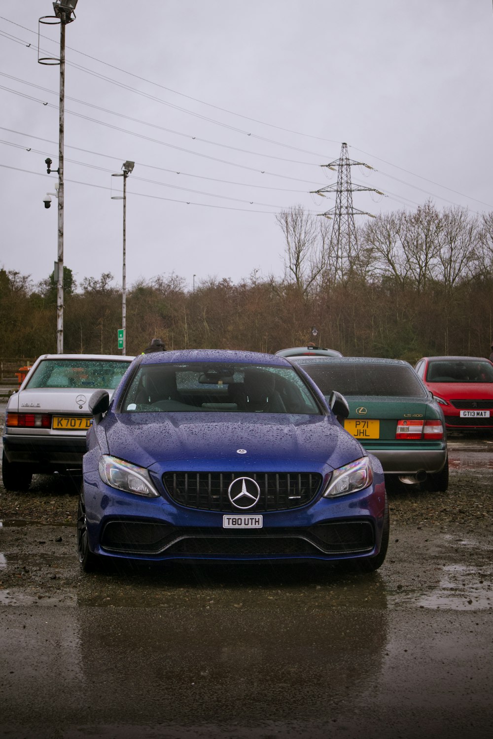 a group of cars parked in a parking lot