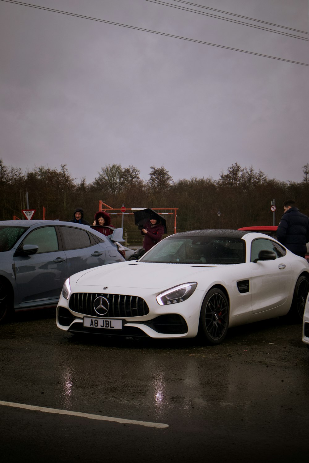 a group of cars parked in a parking lot