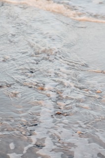A serene beach photo animated to showcase gentle waves.