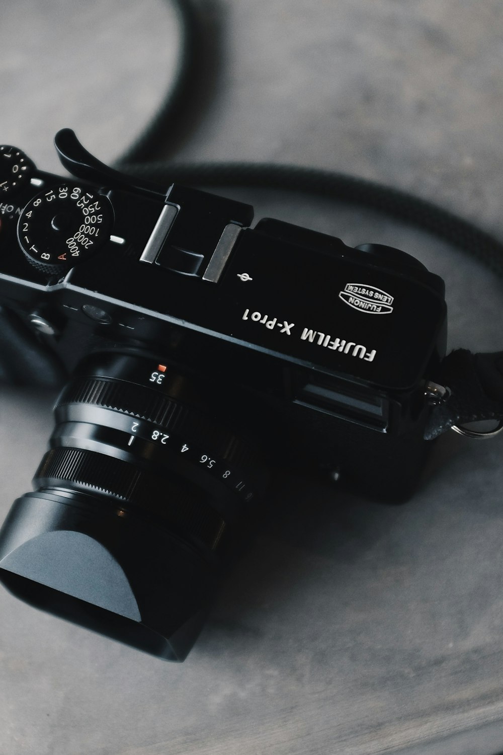 a black camera sitting on top of a table