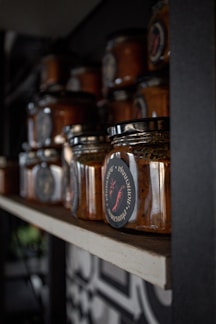 A vibrant selection of artisanal sauces displayed in jars.