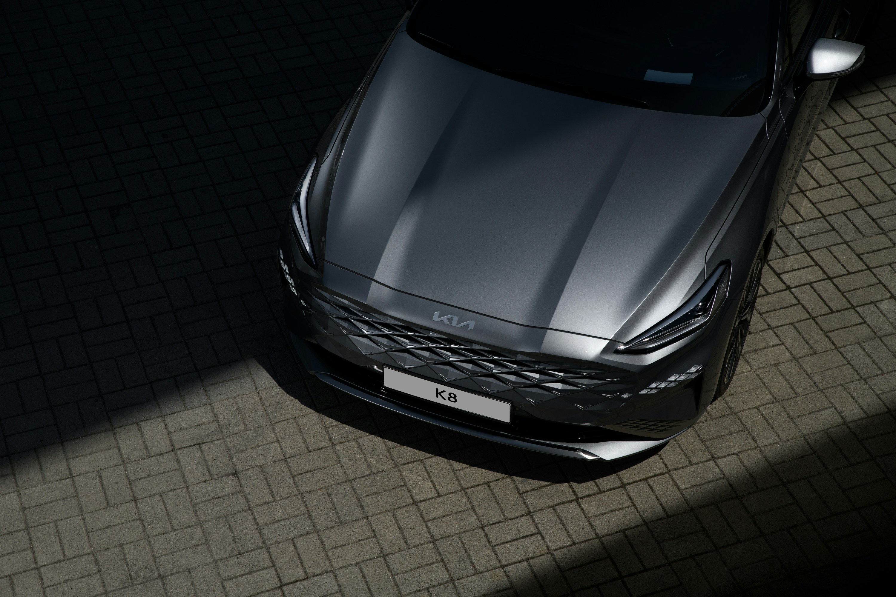 an aerial view of a car parked in a parking lot