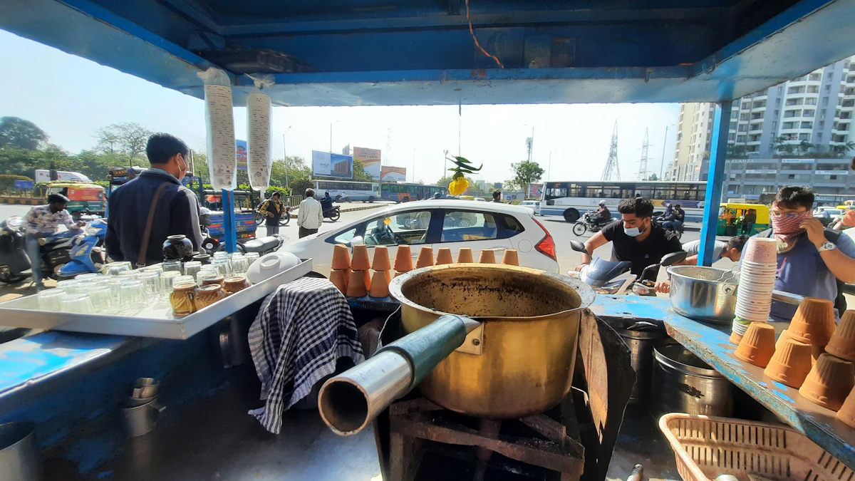People gathered at a street tea stall in Ahmedabad