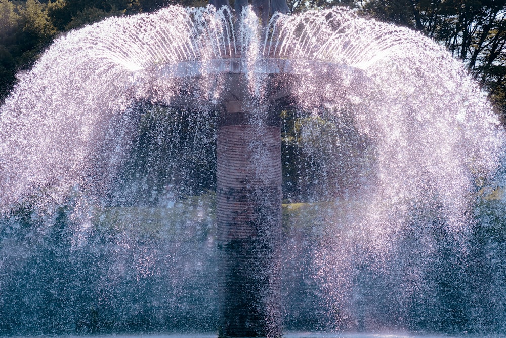 a large fountain spewing water into the air