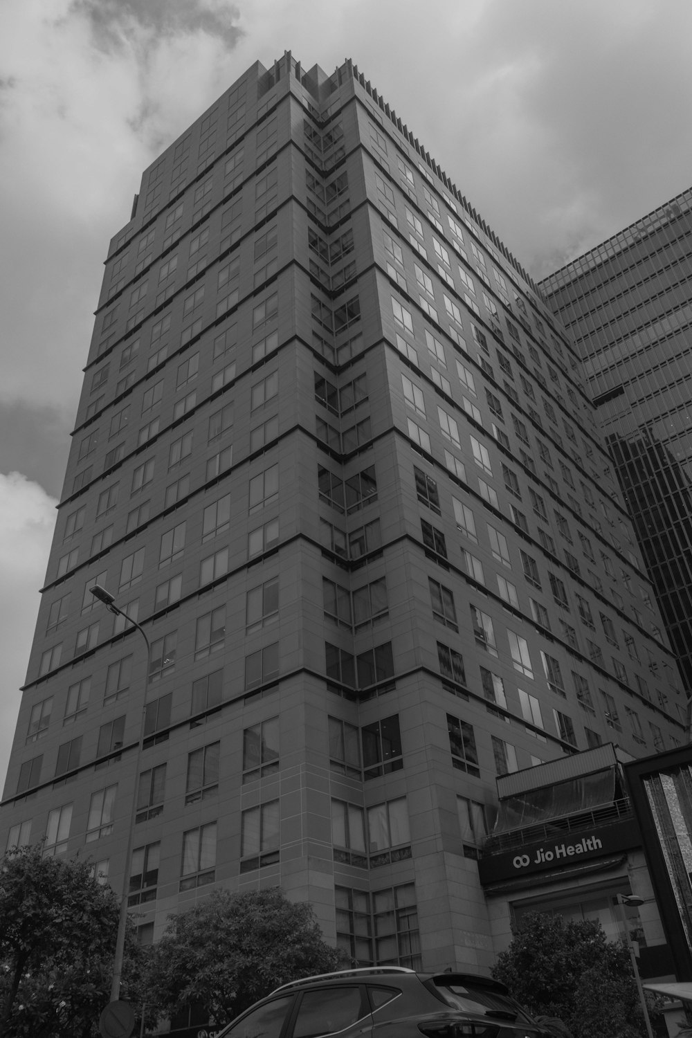 a black and white photo of a tall building