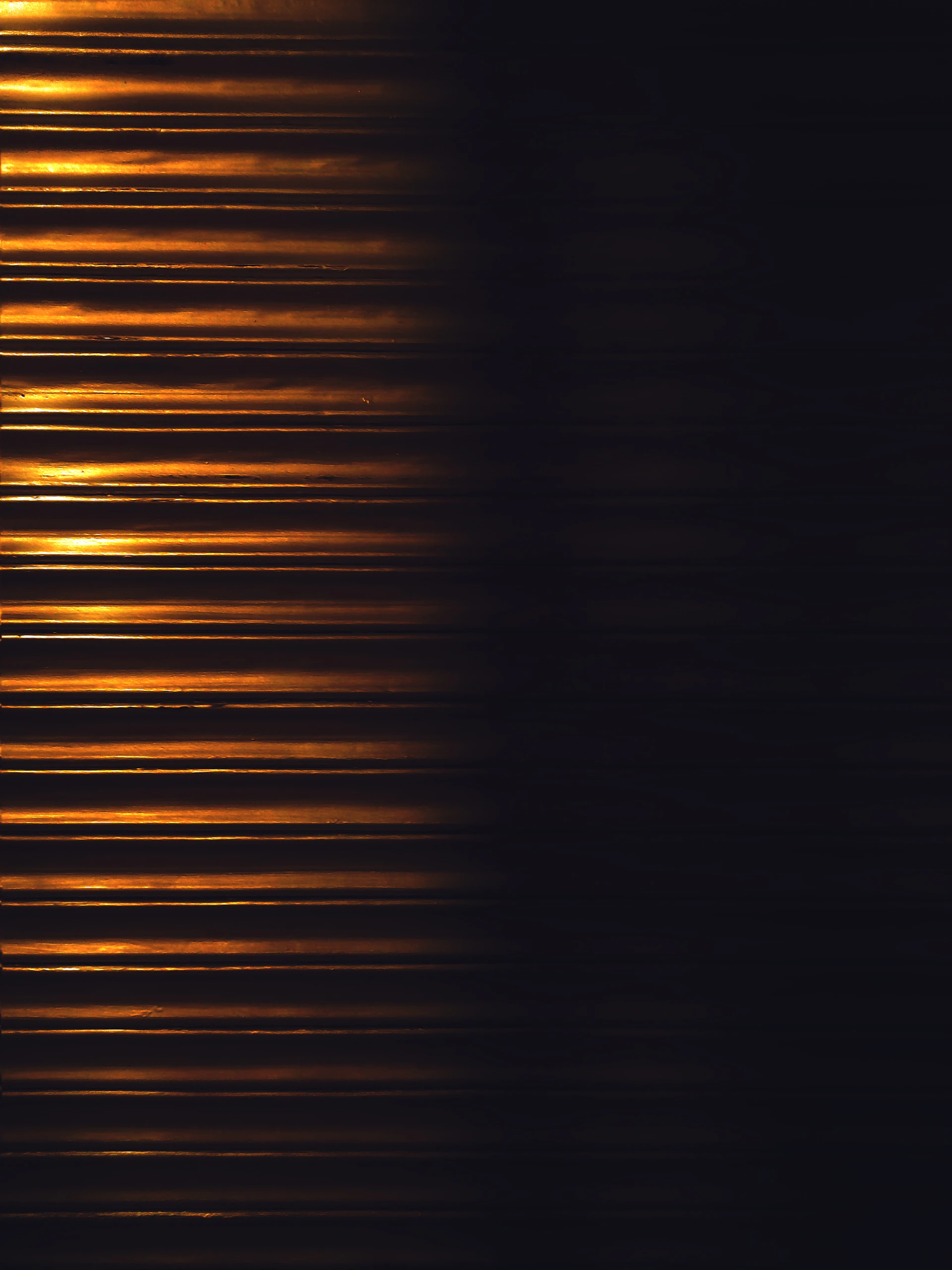 a blurry photo of a street sign in the dark