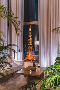 Cozy living room with natural light and modern furniture in a high-rise apartment