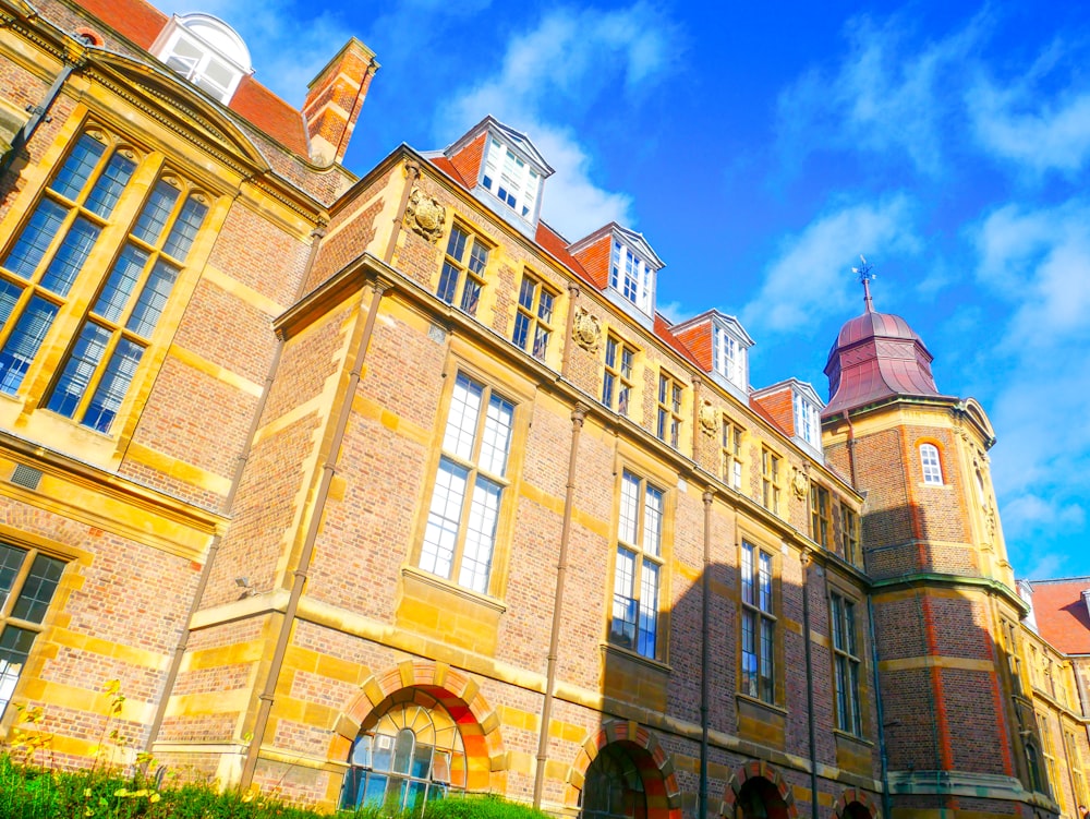 a large brick building with a clock tower