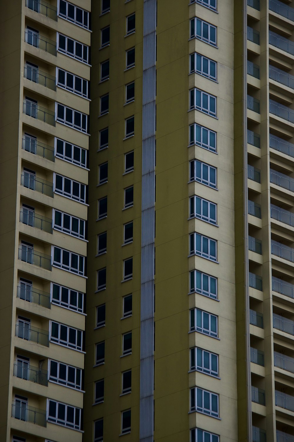 a tall building with a clock on the side of it