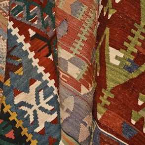 a close up of a multi colored rug