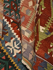 a close up of a multi colored rug