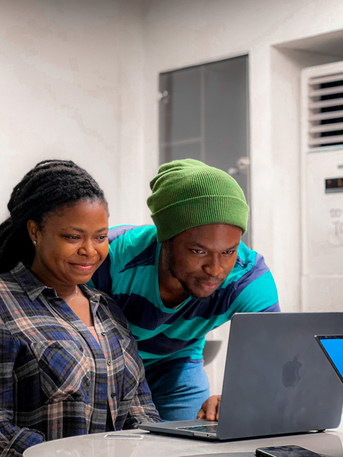 Black Kenyan business team reviewing digital transformation results