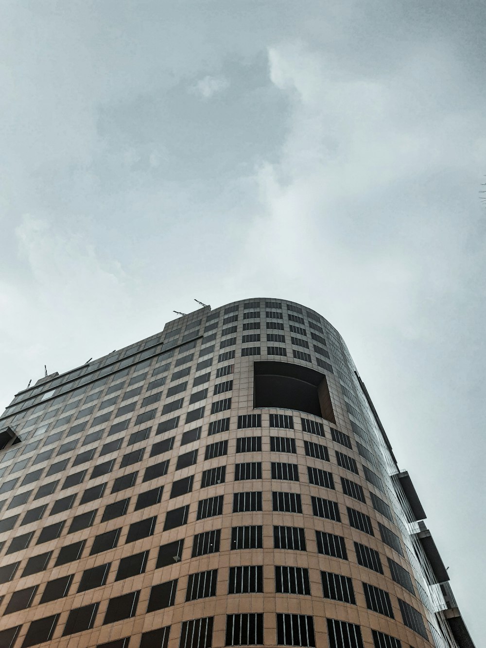 a tall building with a clock on the top of it