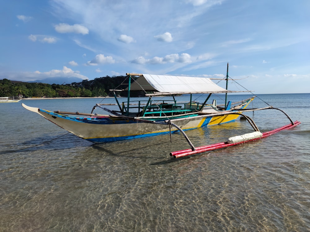 a couple of boats that are sitting in the water