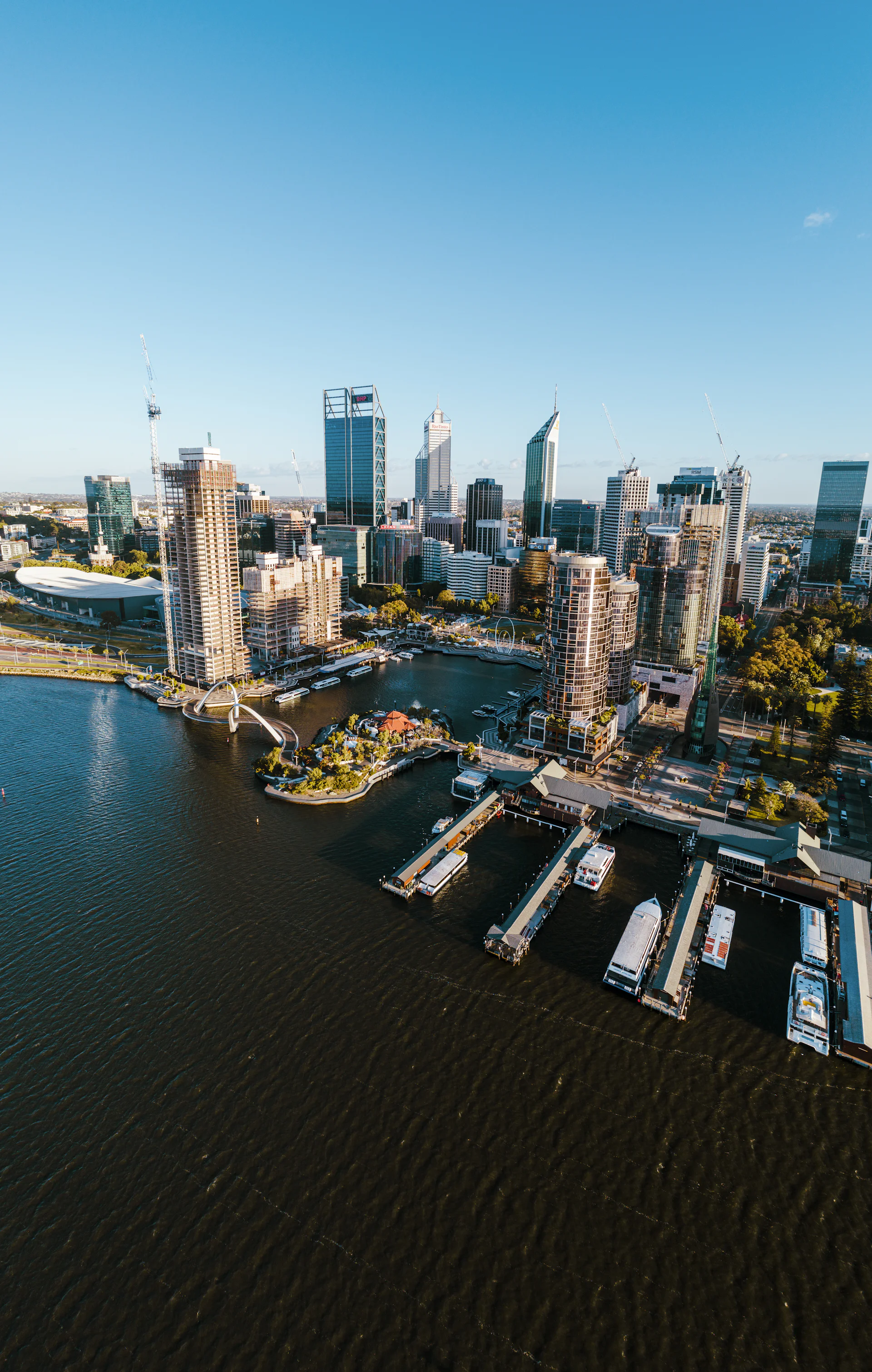 Perth skyline at sunset across the Swan River — destination for Kiwi movers