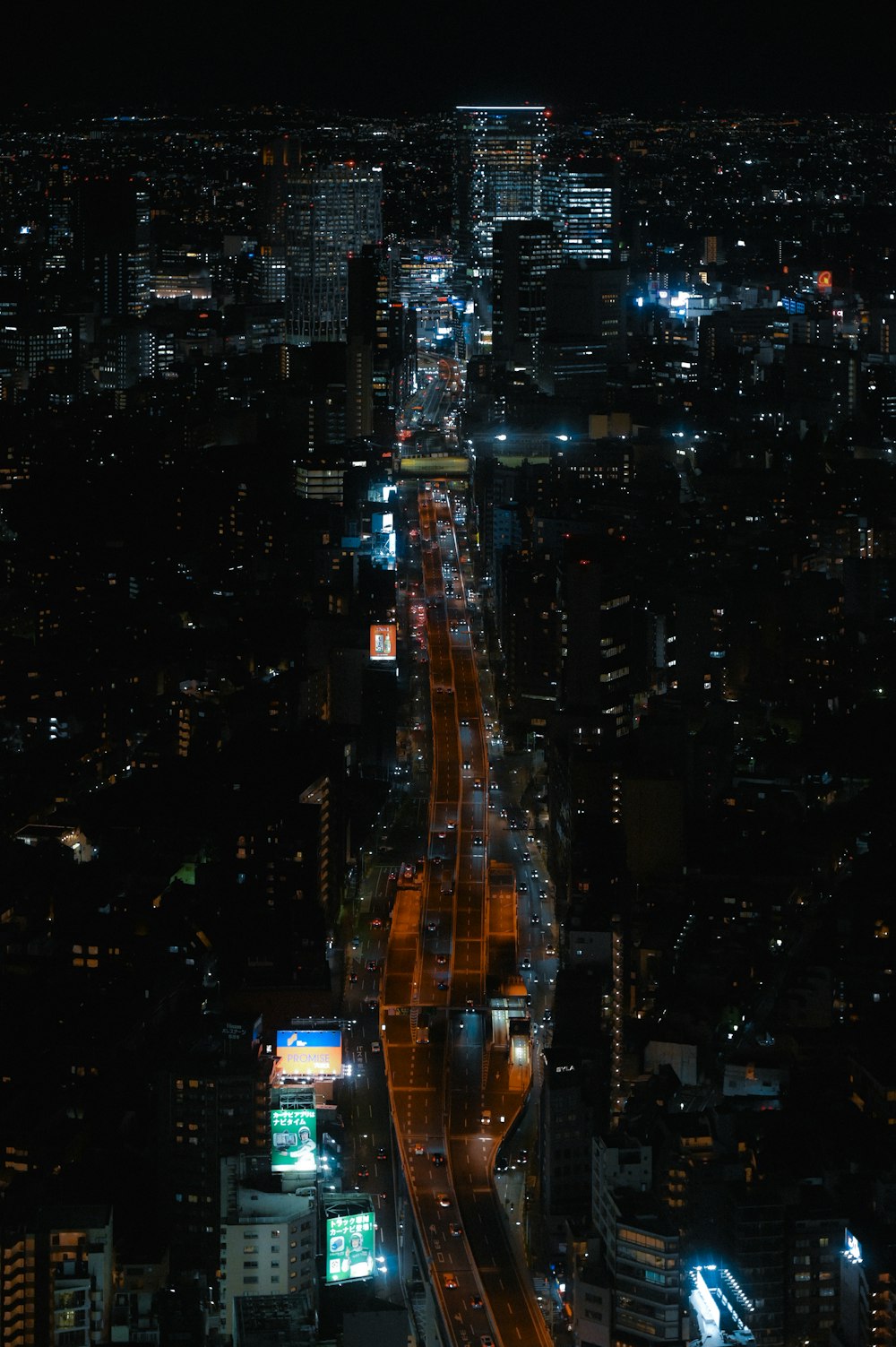 an aerial view of a city at night