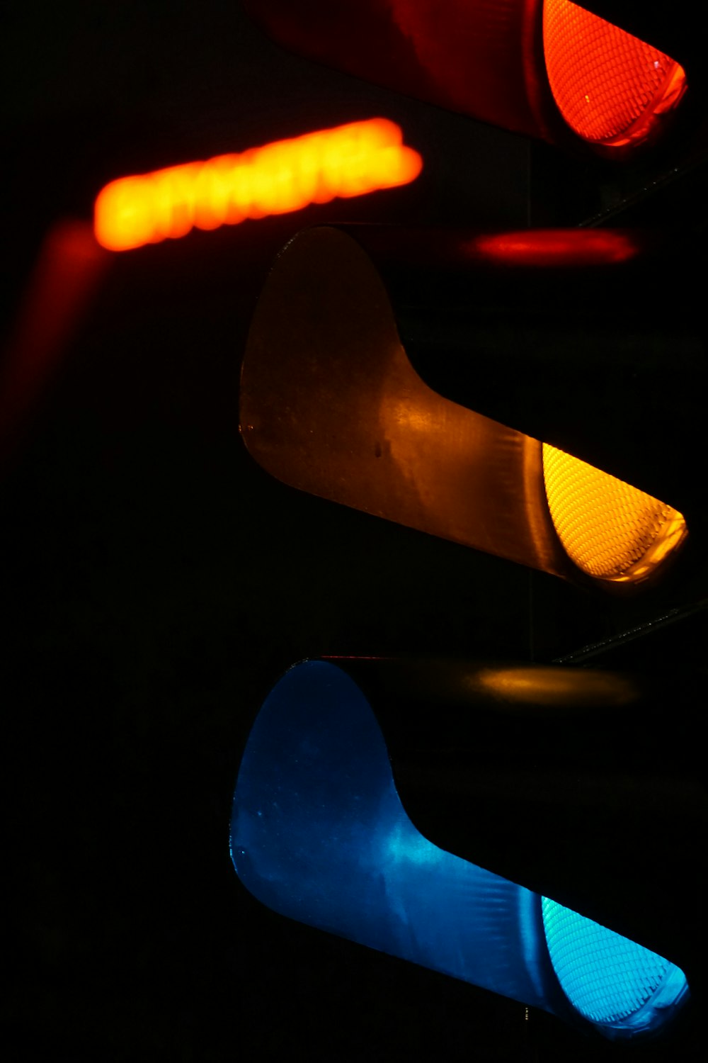 a close up of a traffic light at night