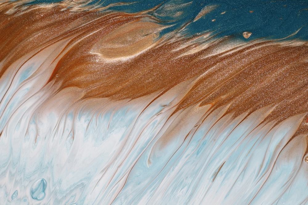 a close up view of water and sand