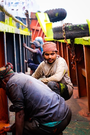 a group of men standing next to each other