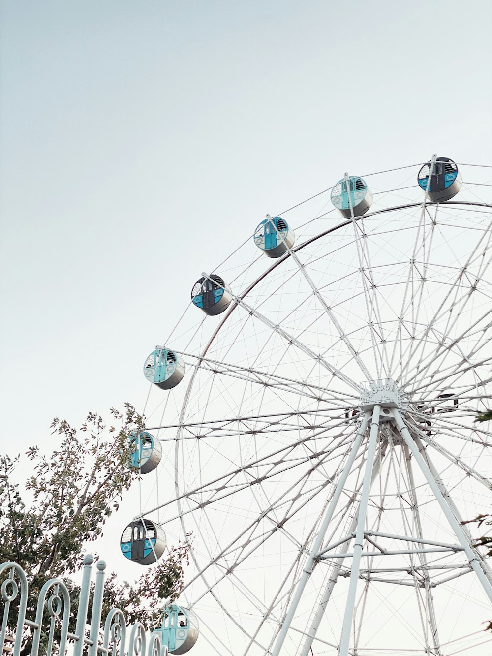 a ferris wheel with blue and white decorations