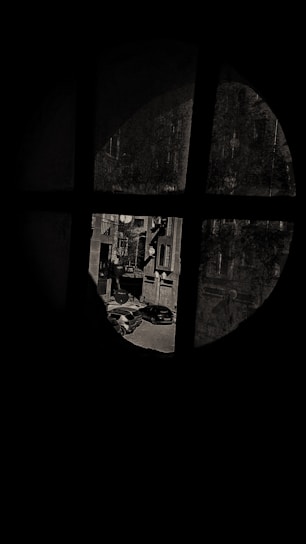 Window view from the Heritage Suite overlooking a quiet city street.