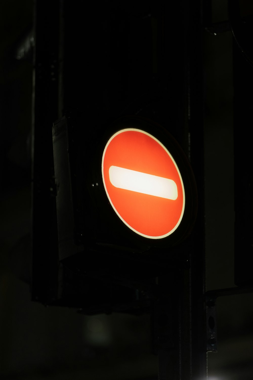 a close up of a traffic light with a red light