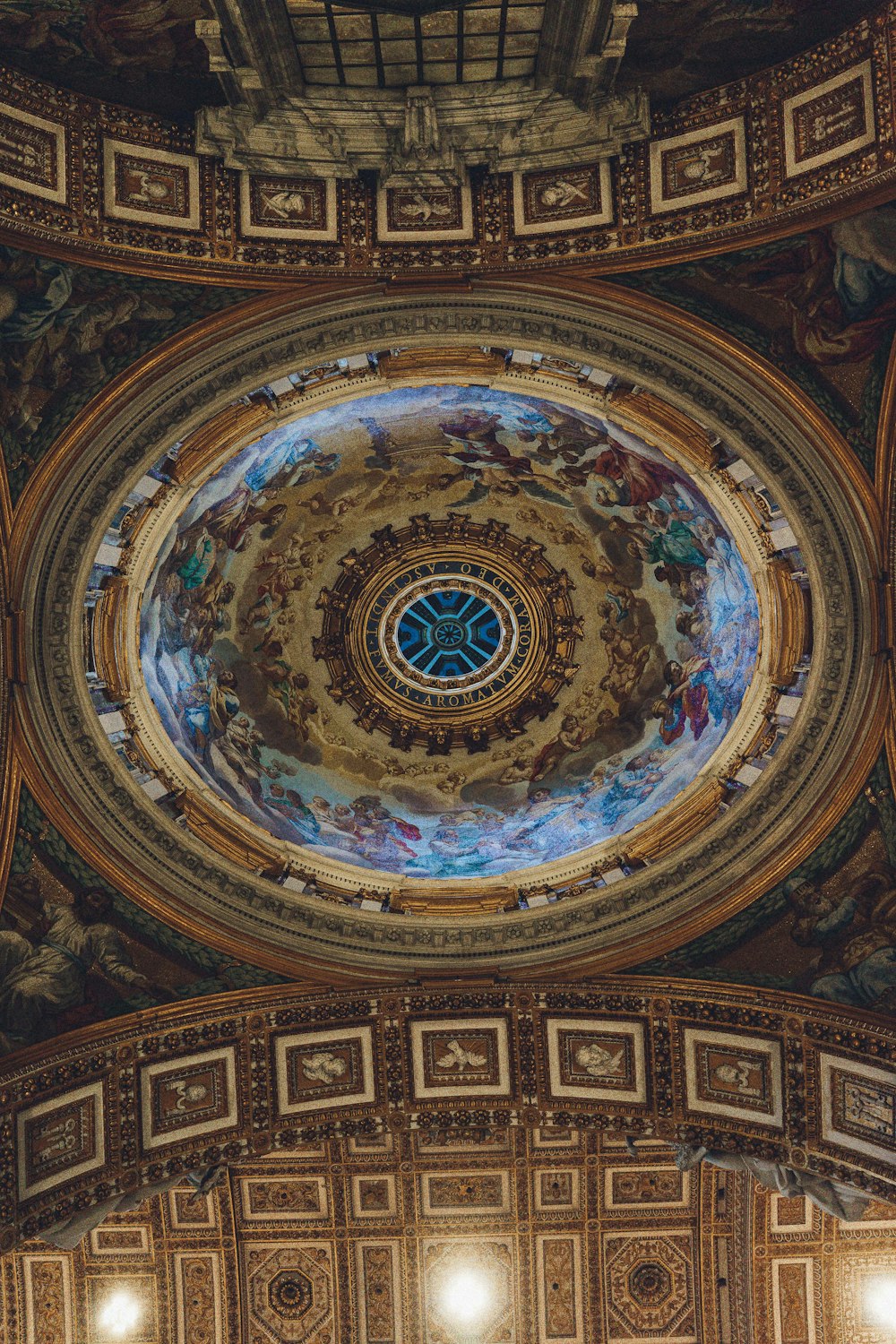 the ceiling of a building with a painted ceiling