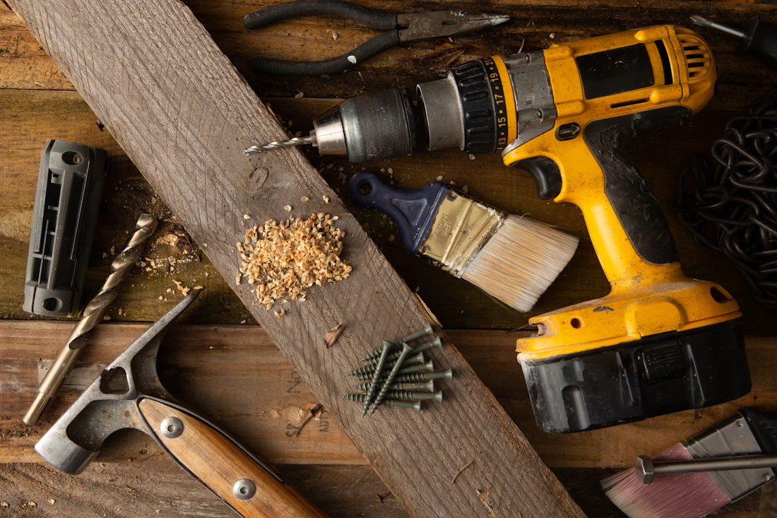 Hand tools arranged on a worktable