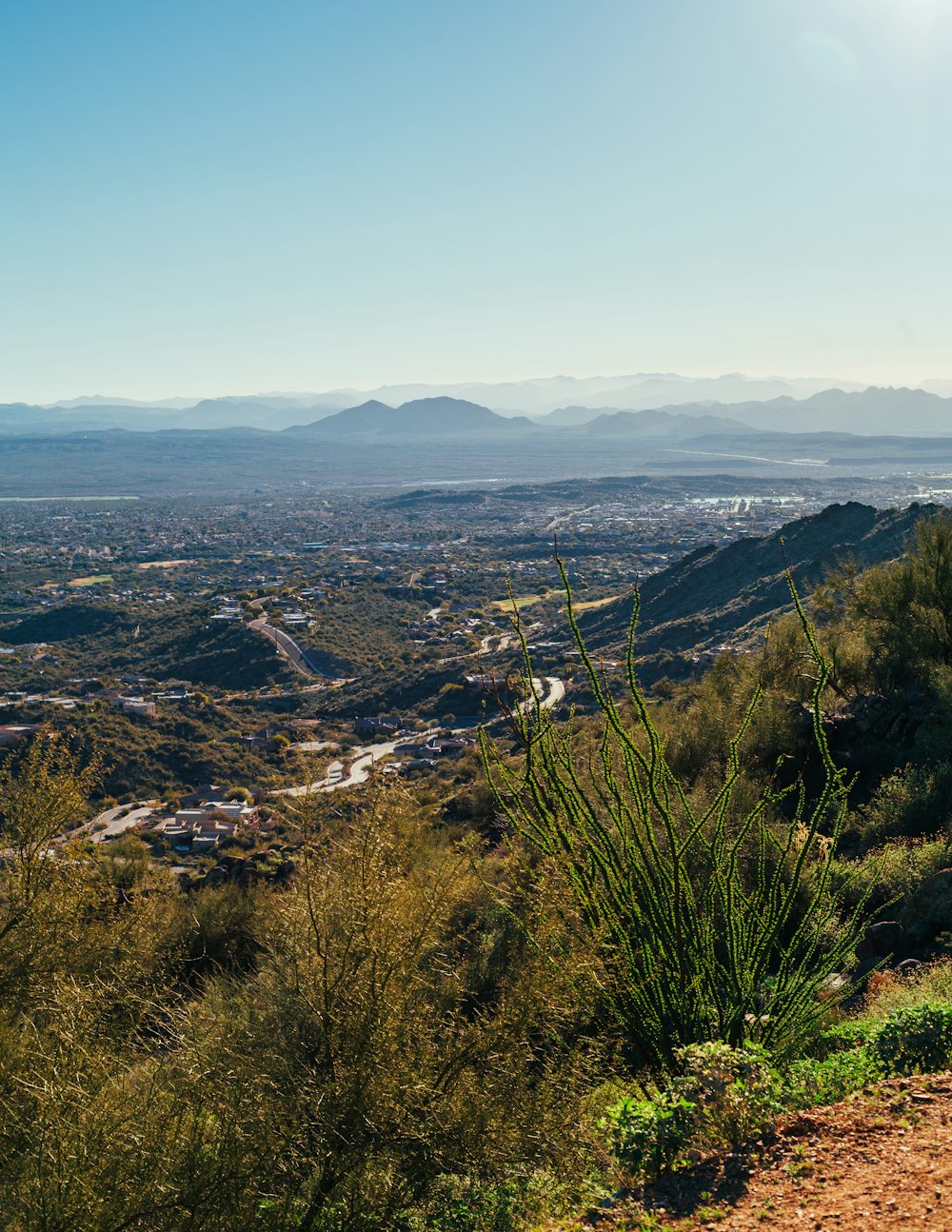 a view of a city from a hill top