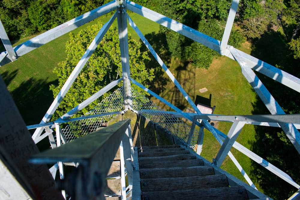 a view from the top of a metal staircase