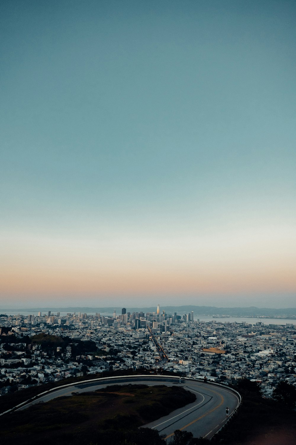 a view of a city from a hill