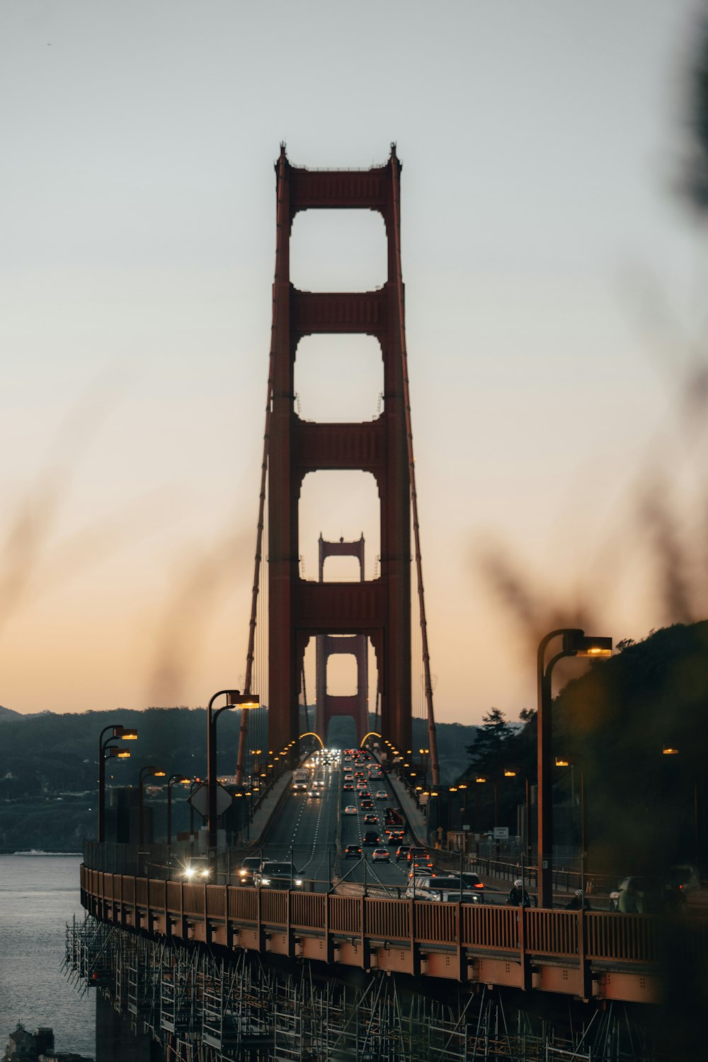 a view of the golden gate bridge at dusk