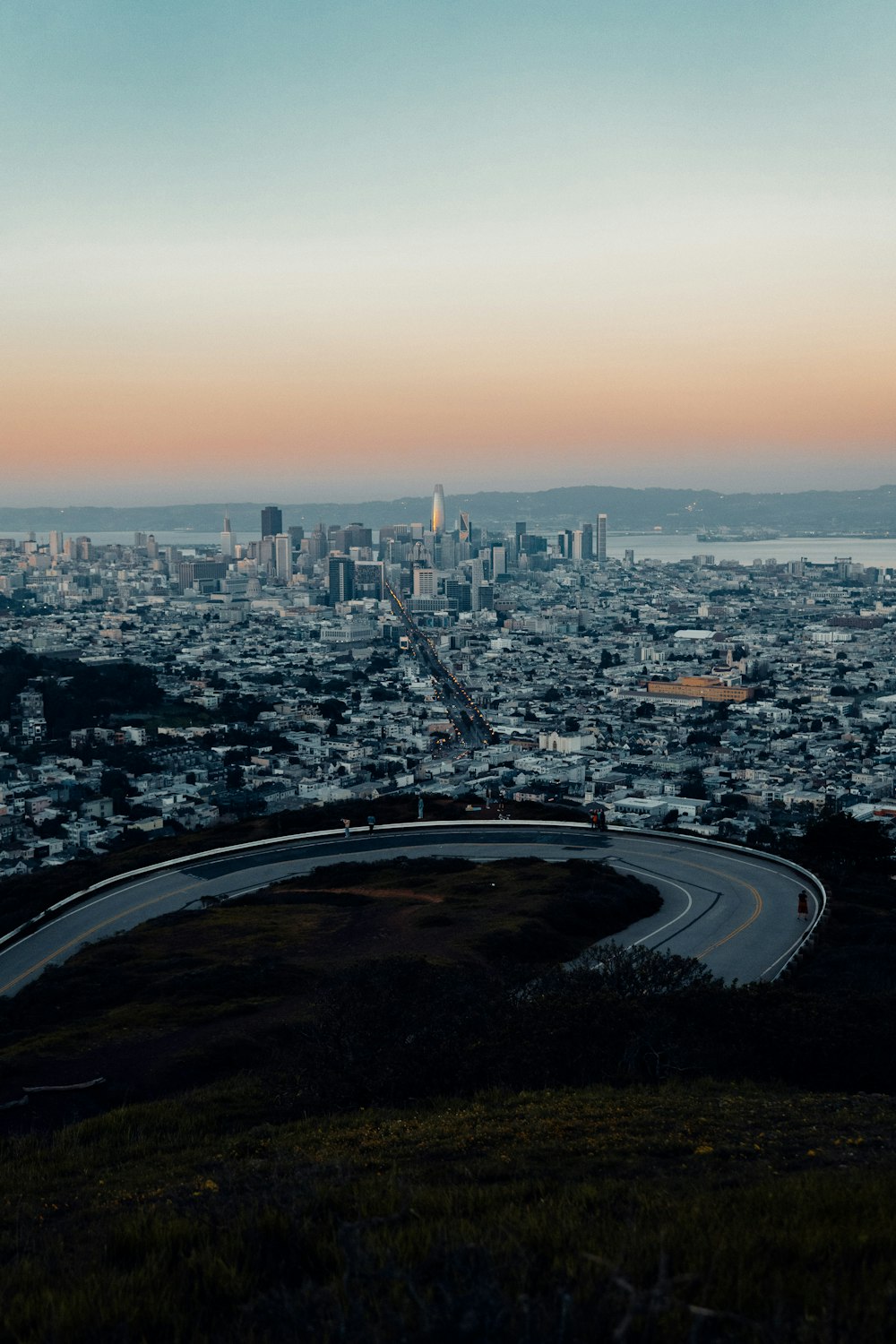 a view of a city from a hill