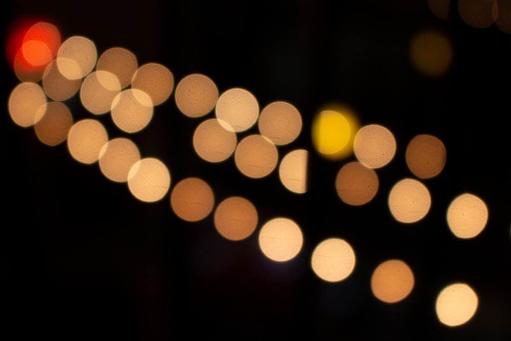 a blurry photo of a street light at night