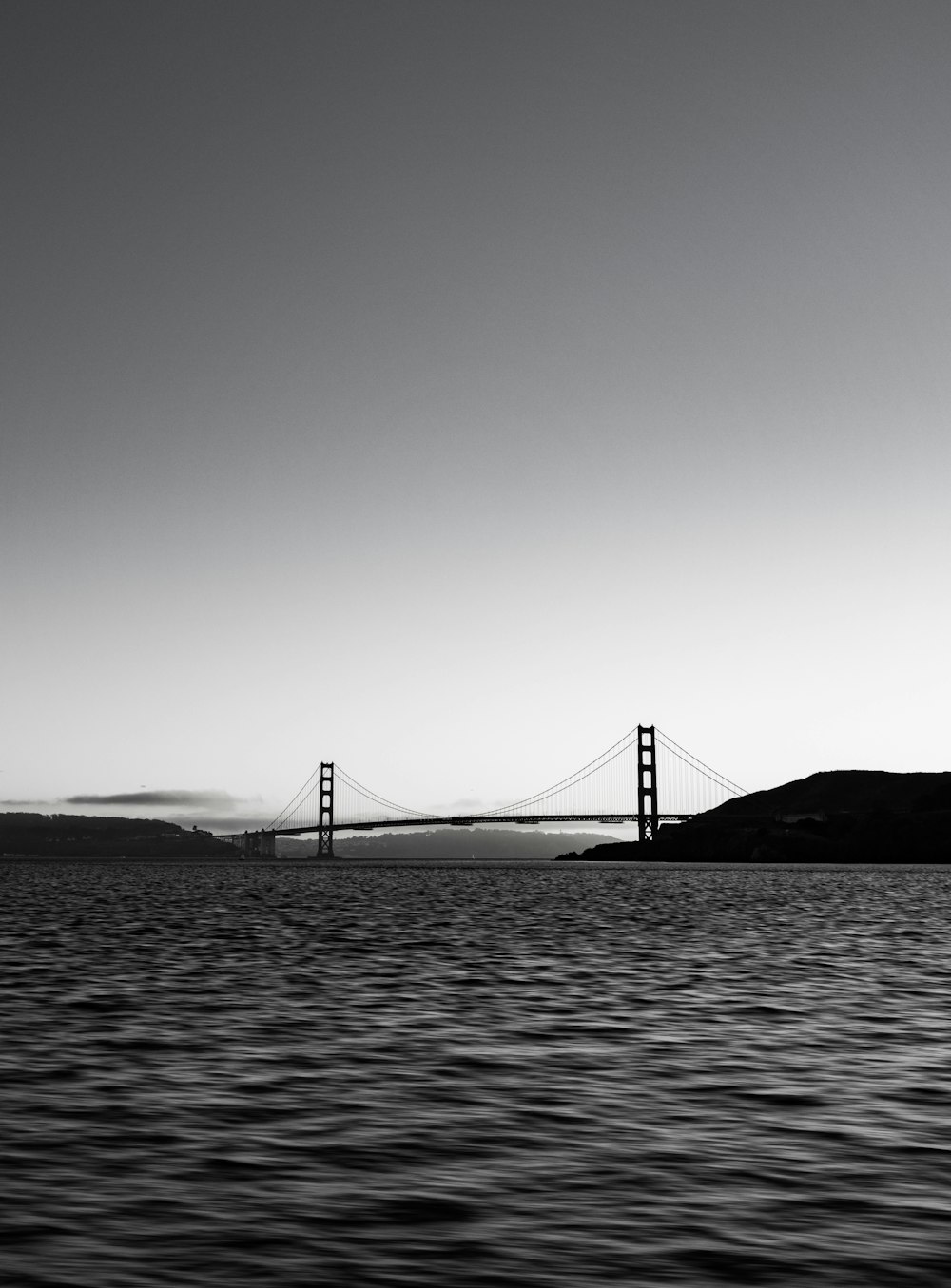 a black and white photo of the golden gate bridge