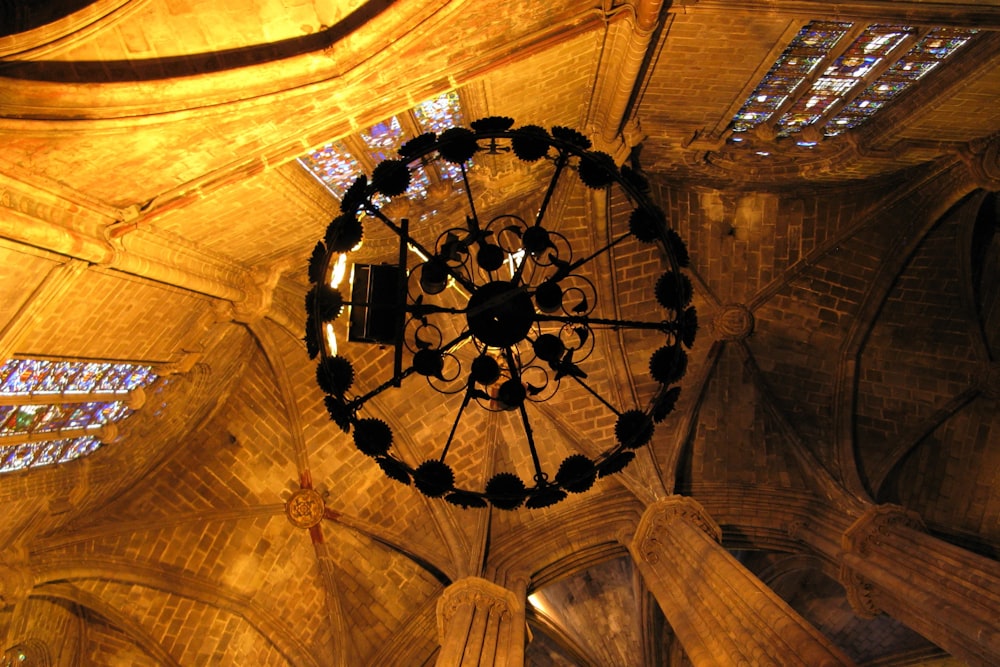 a chandelier hanging from the ceiling of a building