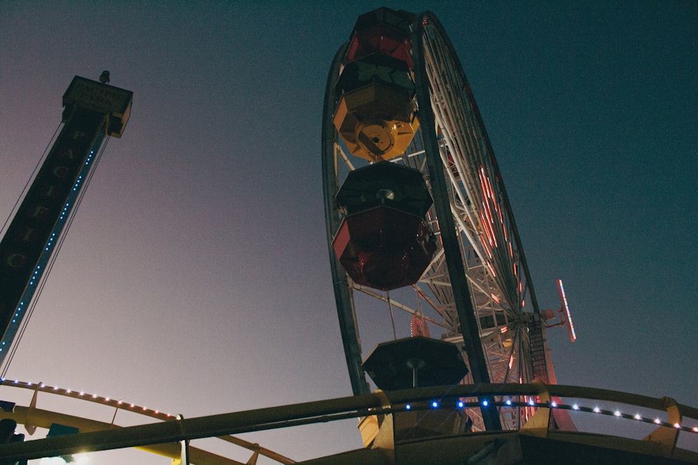 a ferris wheel at a carnival at night