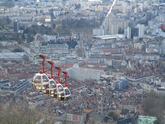 The city from a cable-car bubble — Grenoble, France