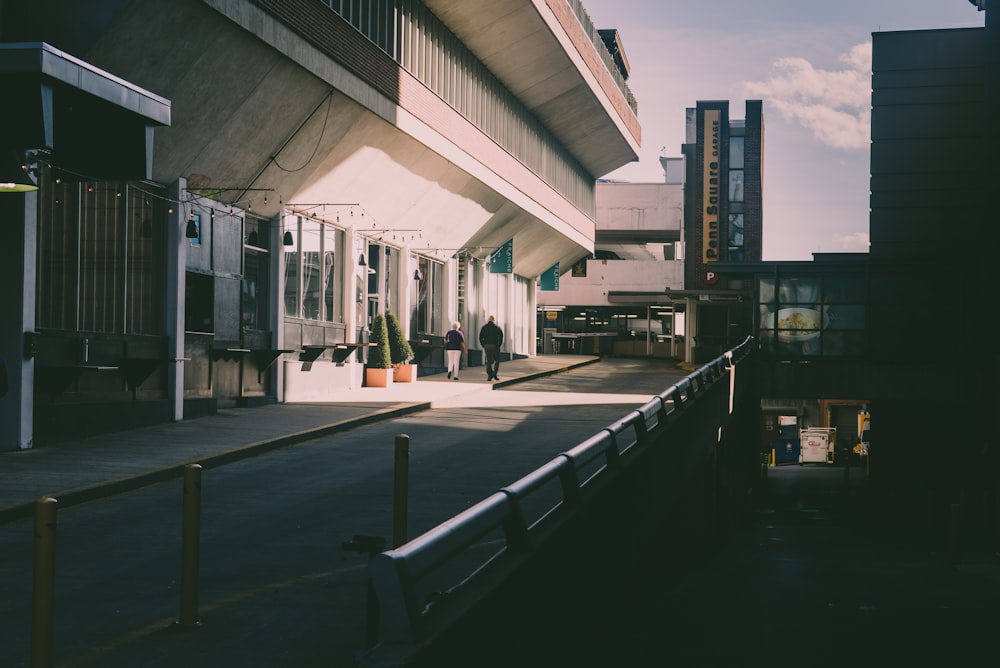 a train station with a train on the tracks