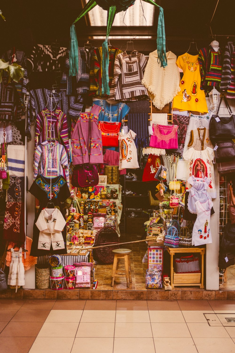 a store with clothes and other items on display