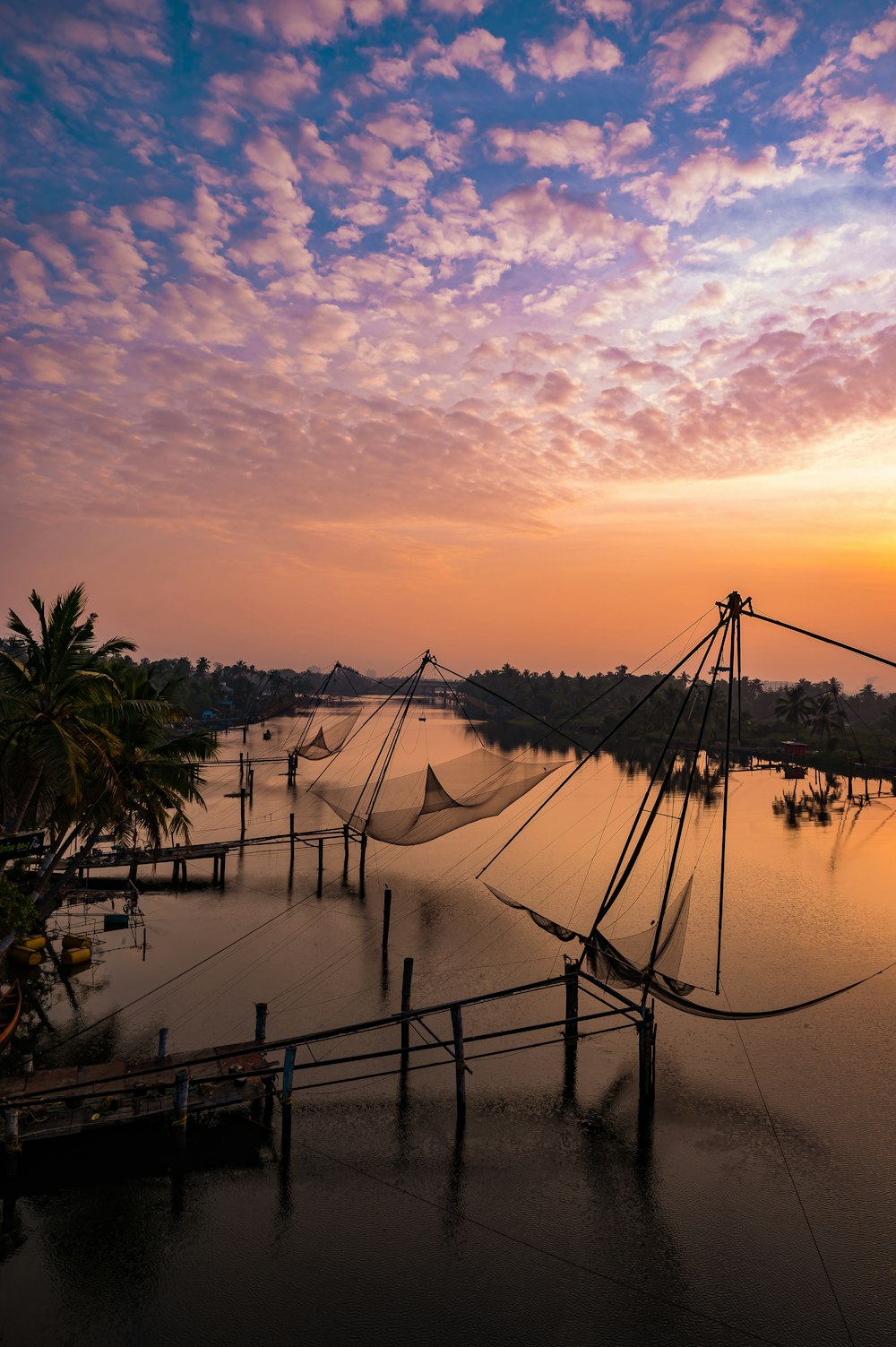 a group of nets sitting on top of a body of water