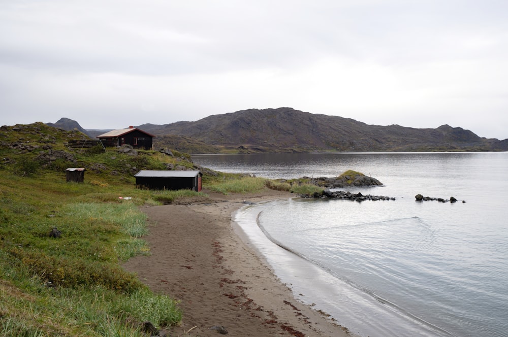 a house on the shore of a body of water