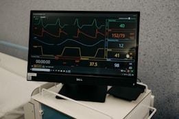 a monitor is on a stand in a room