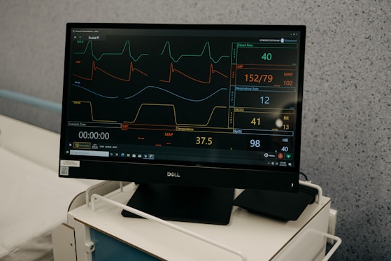 a monitor is on a stand in a room